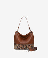 Wrangler hobo shoulder bags in BR-LP — Vegan leather with tribal pattern accent